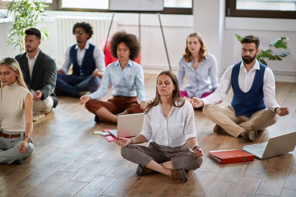 A group taking a quiet moment for meditation